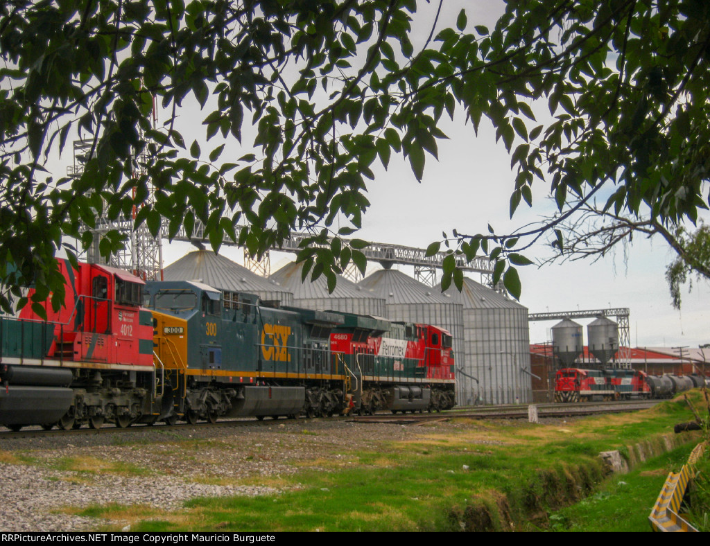 FXE ES44AC and CSX AC4400 Locomotives leading a train